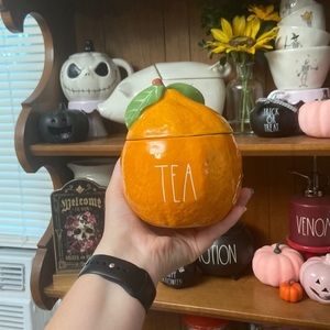 Used Rae Dunn orange tea canister